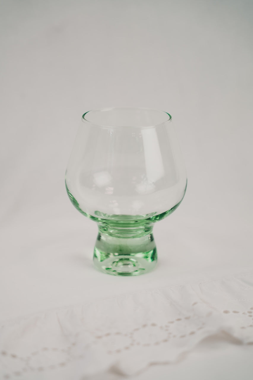 four green cocktailglasses