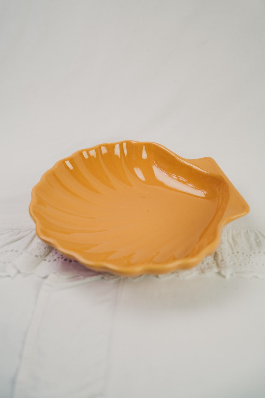 yellow shell dish