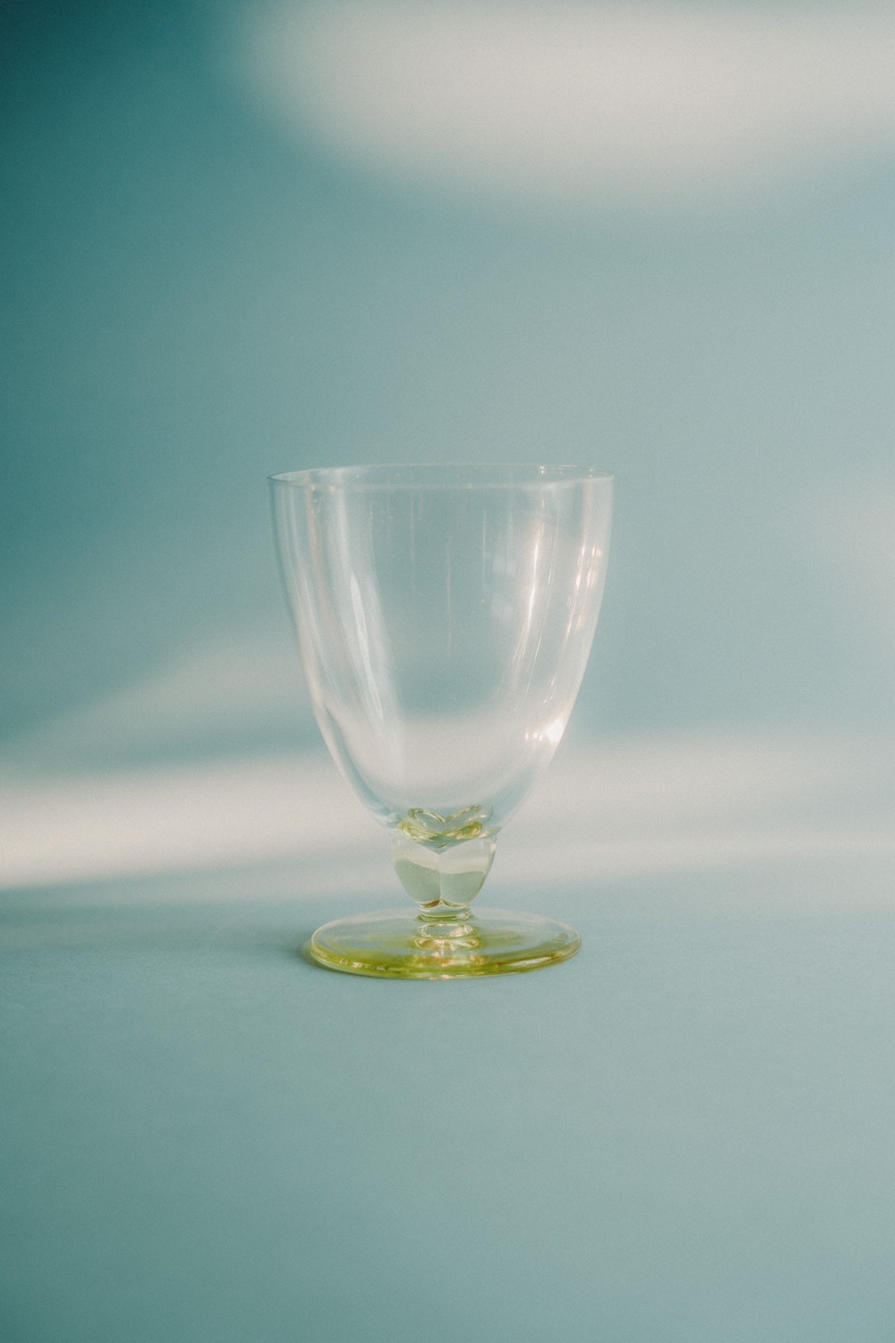 five yellow wine/waterglasses