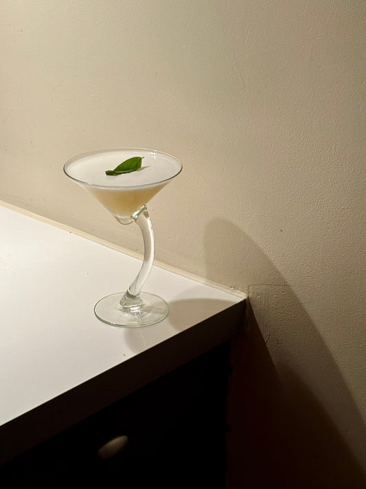 two curved cocktailglasses