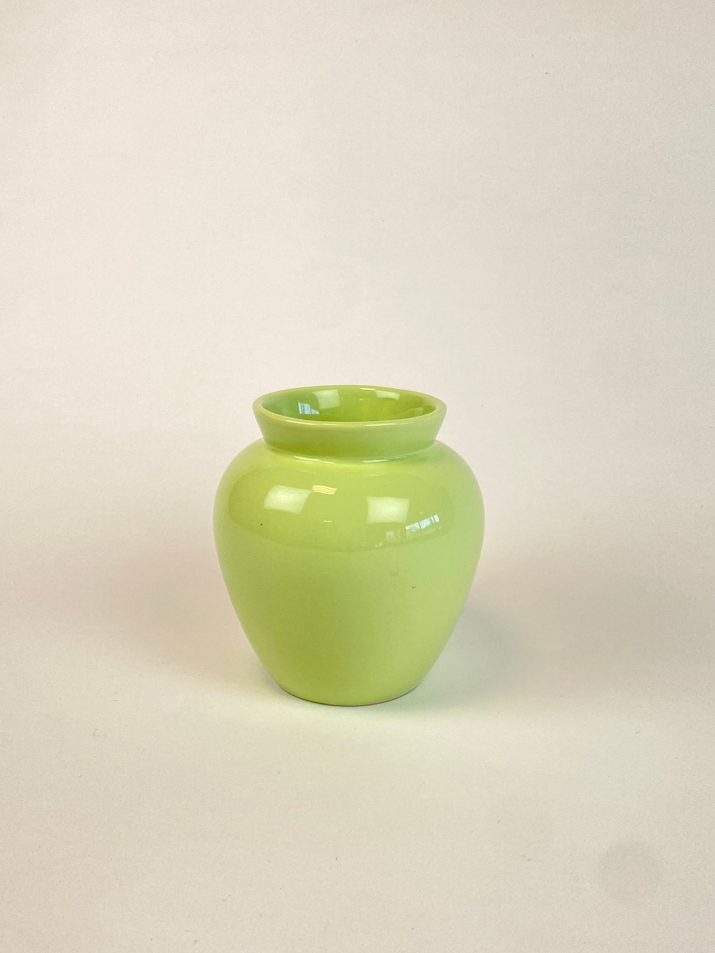 small pastel green vase