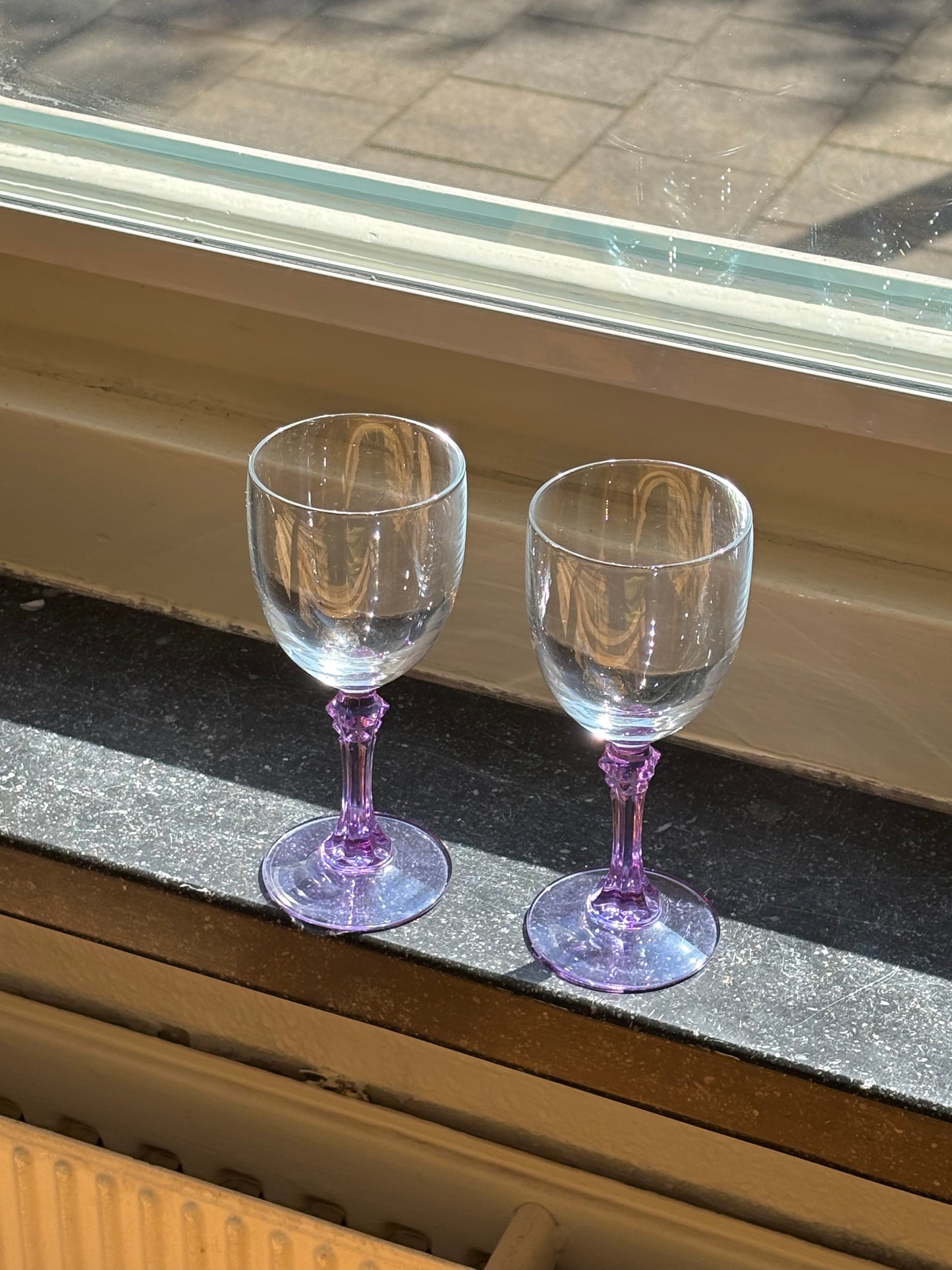 two alexandrite wineglasses
