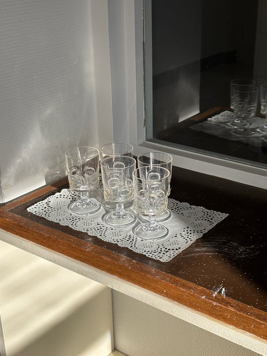 five liquor glasses