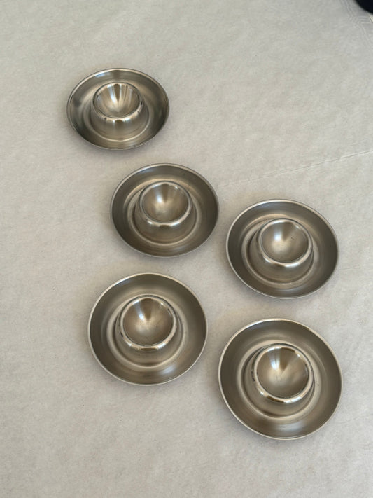 five eggcups