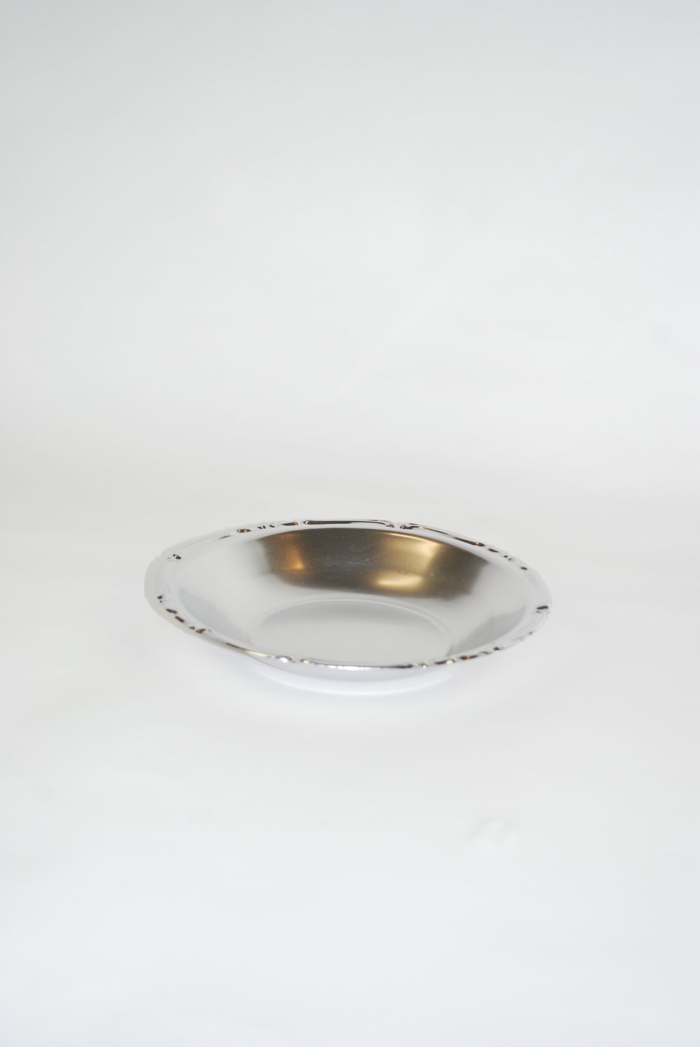 deep round silver dish