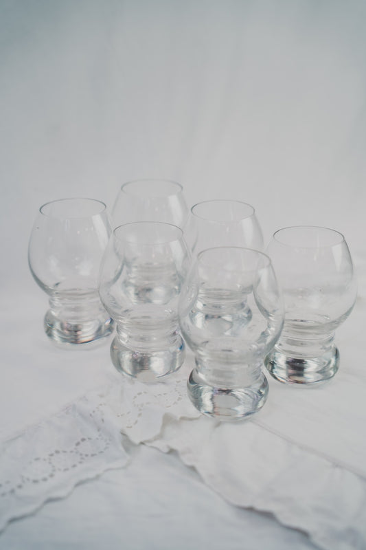 six space age glasses