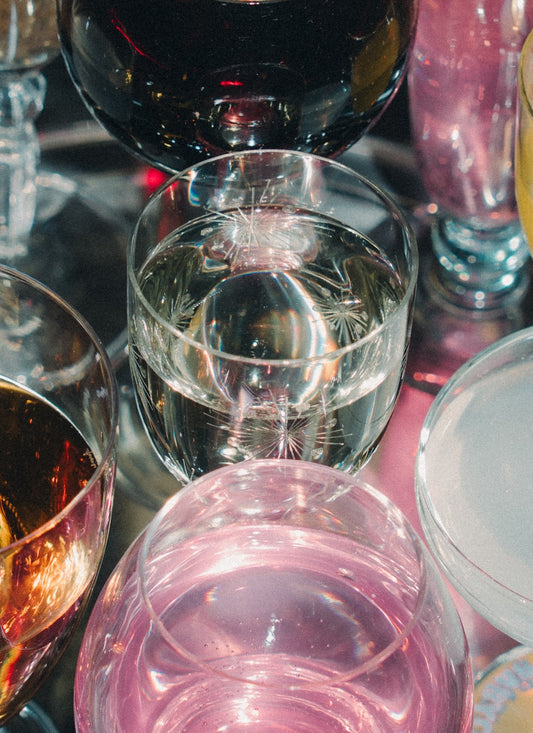 four detailed wineglasses