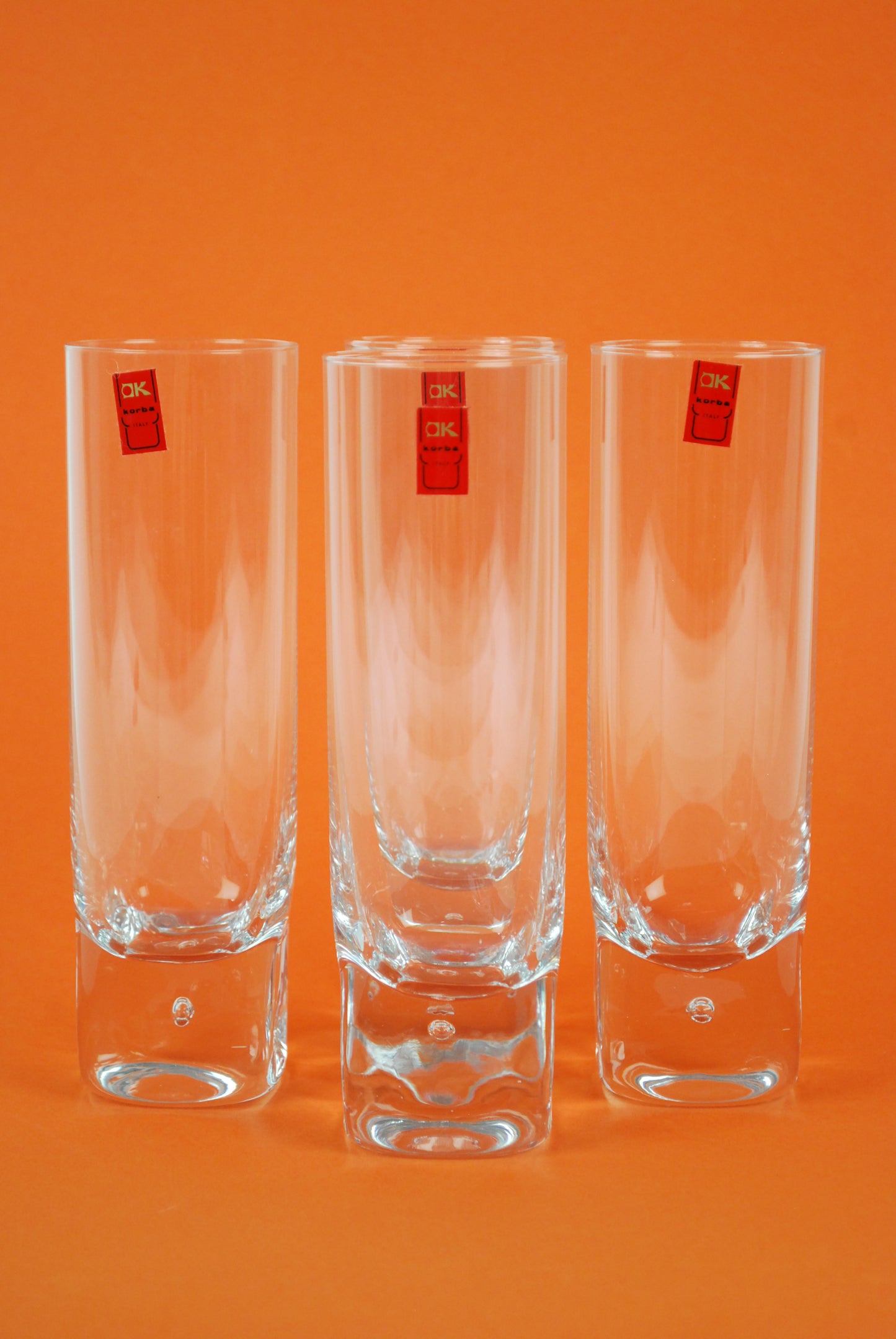 four longdrink glasses