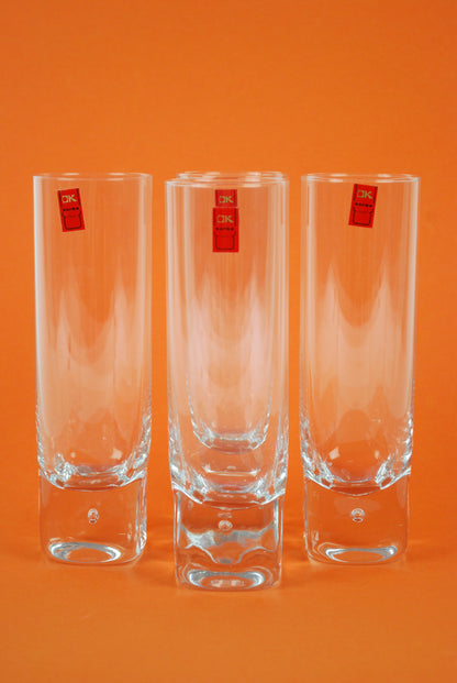 four longdrink glasses