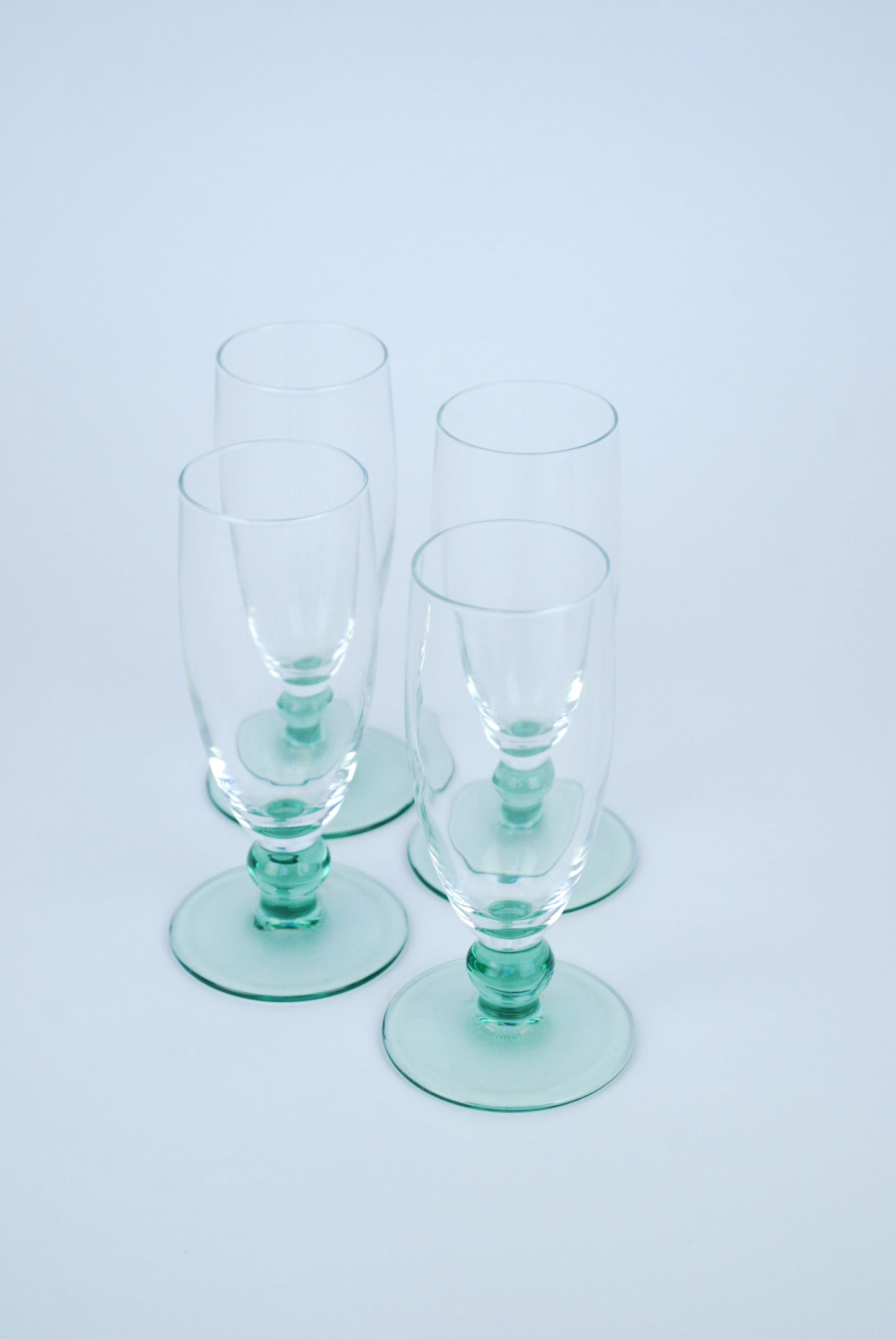 four champagne flutes