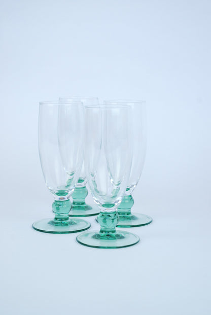 four champagne flutes