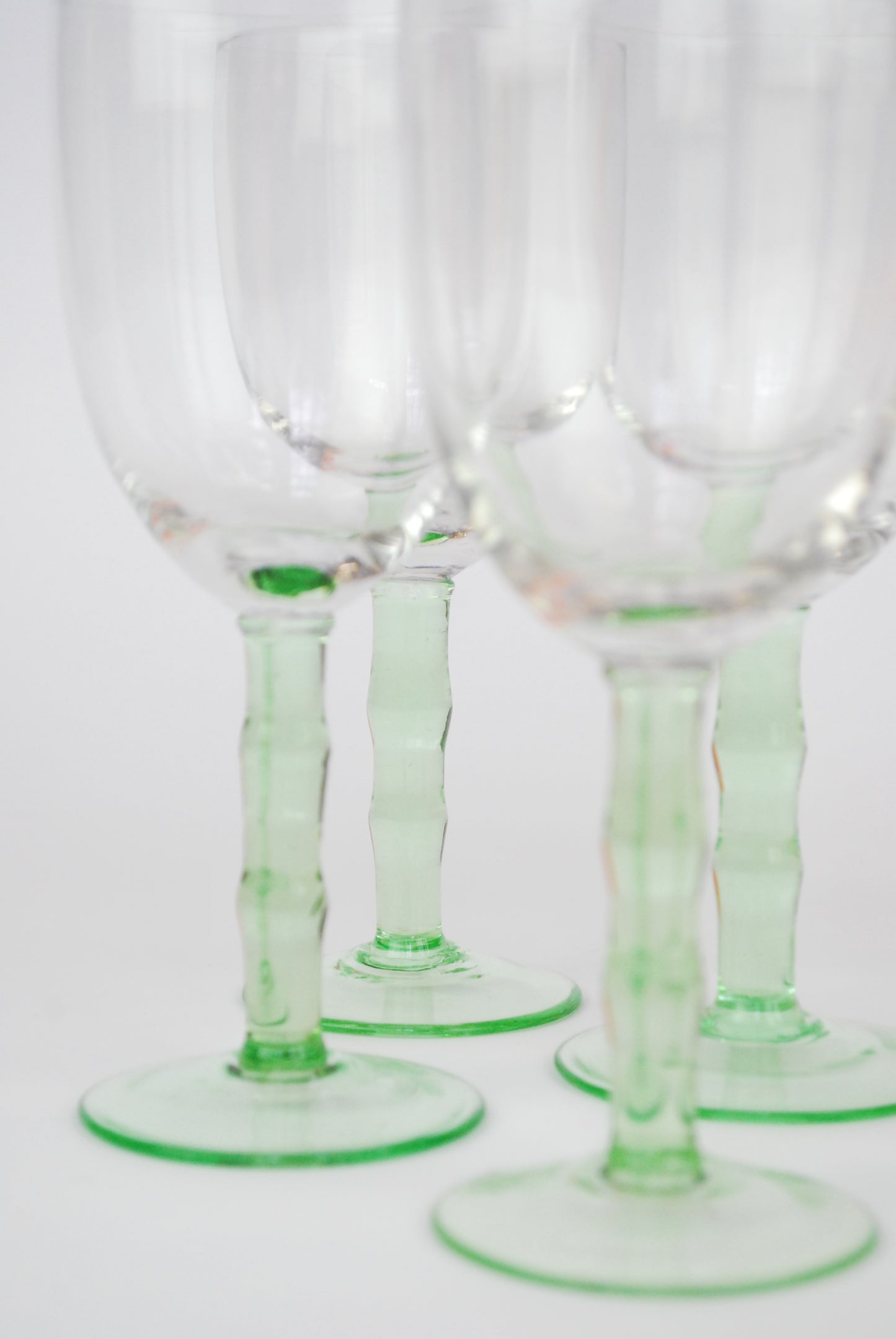 five white wineglasses