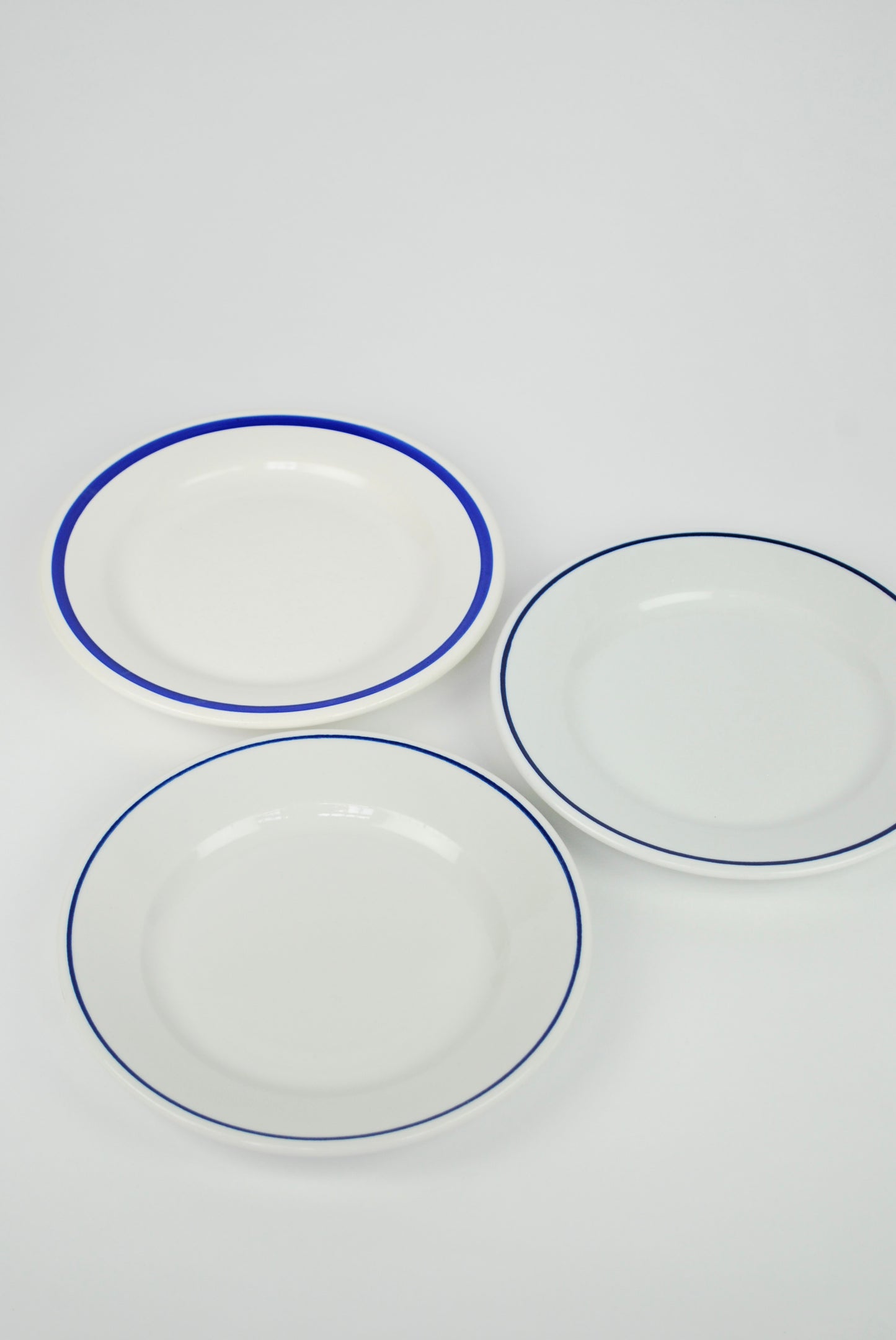 set of three white plates