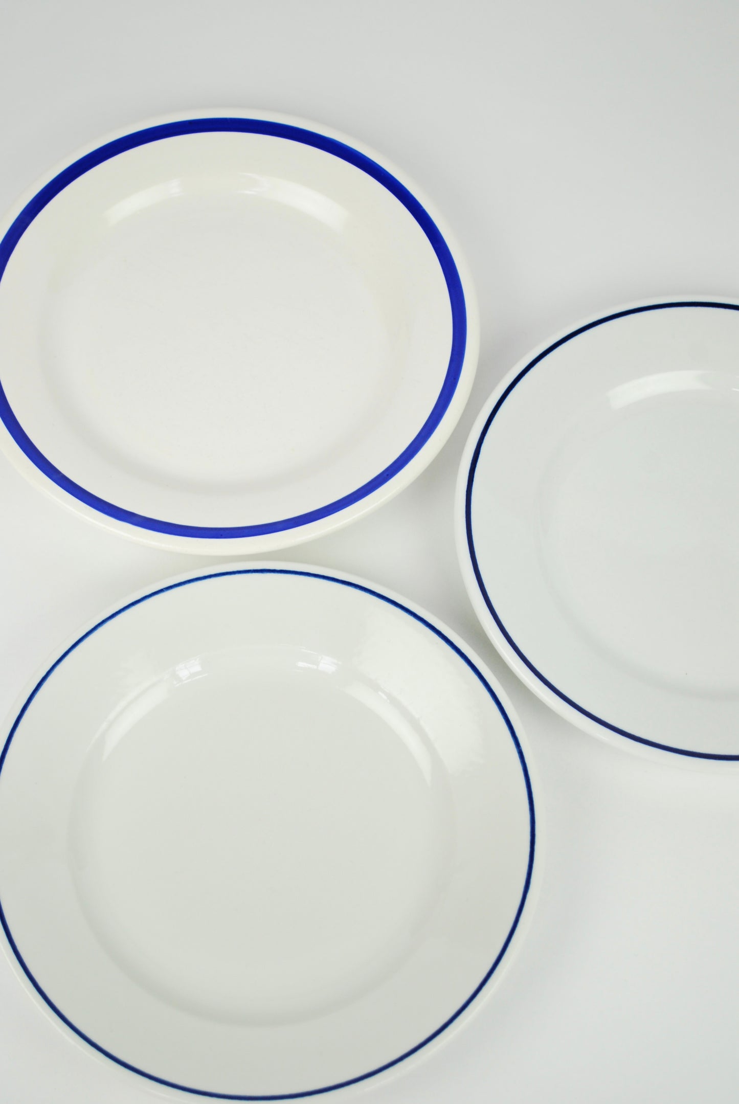 set of three white plates