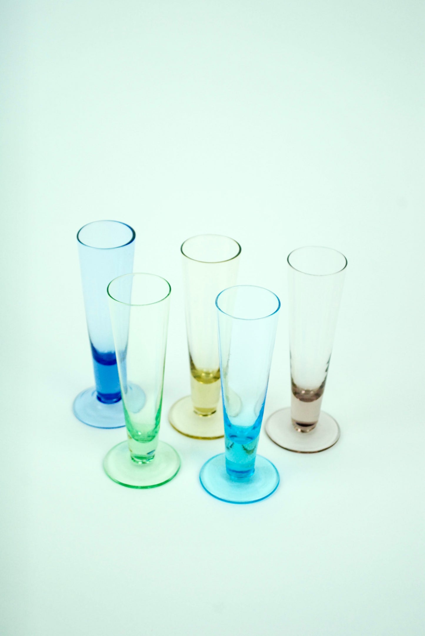 five rainbow shotglasses