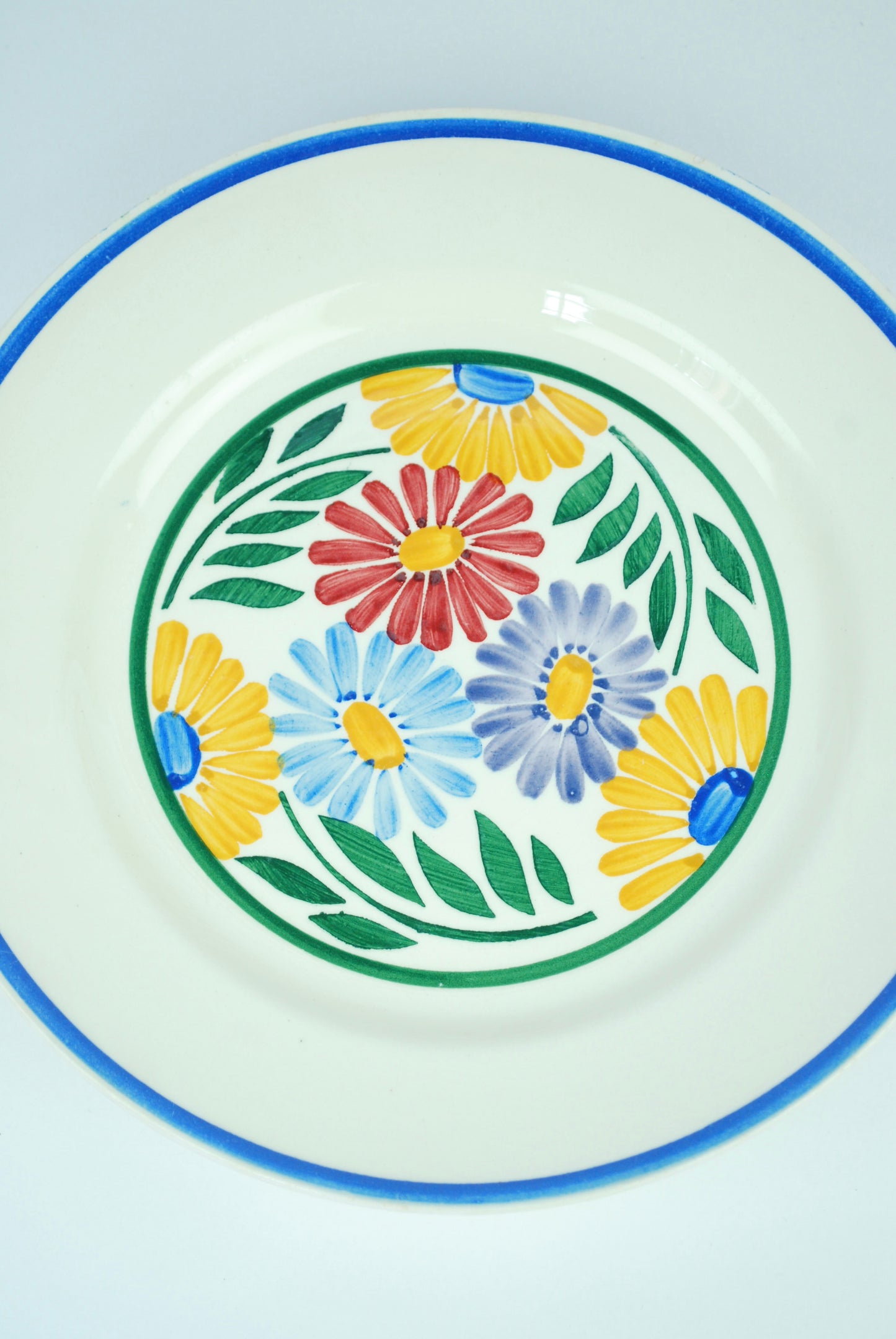 three plates with flowers