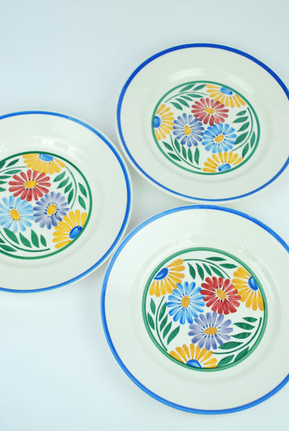 three plates with flowers