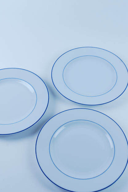 three white plates