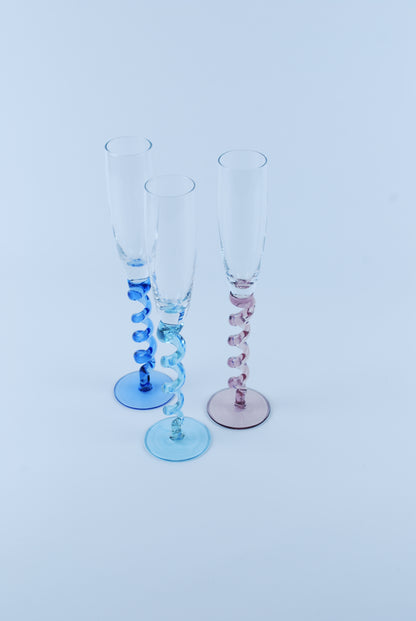 three swirled flutes