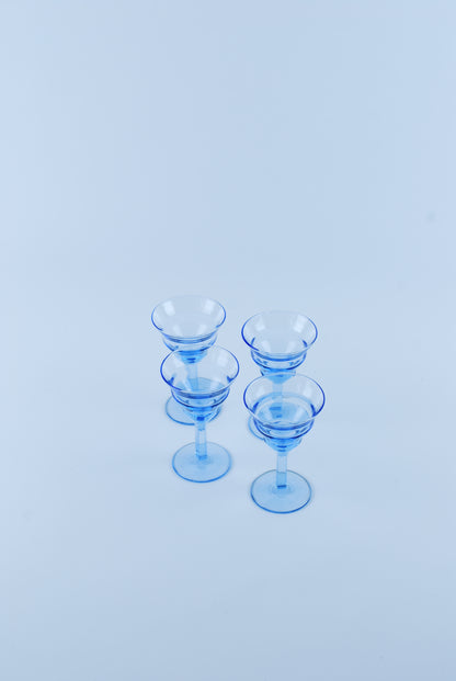 four liquor glasses