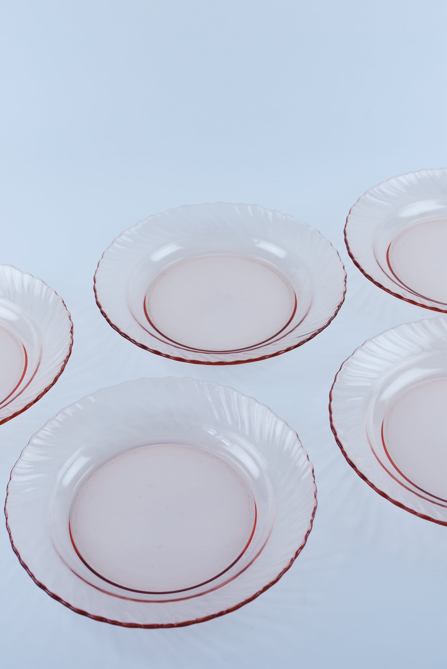 five deep glass plates