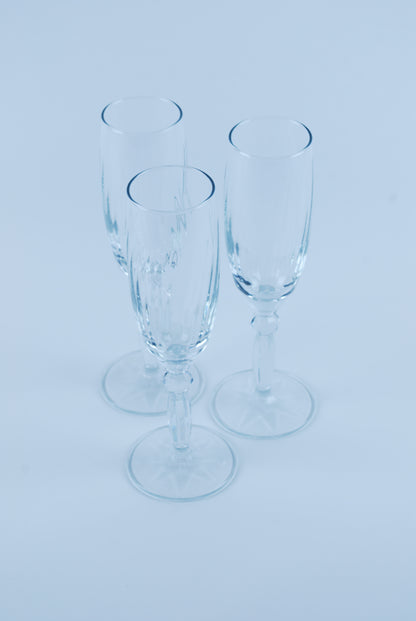 three champagne flutes