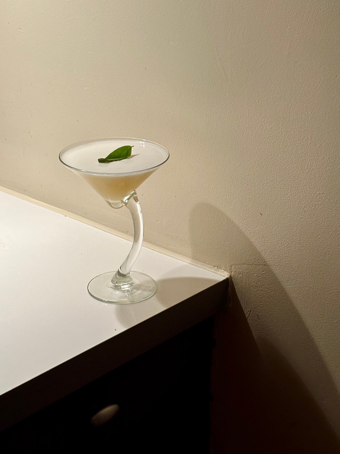 two curved cocktailglasses