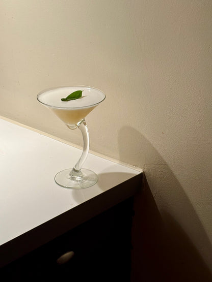 two curved cocktailglasses