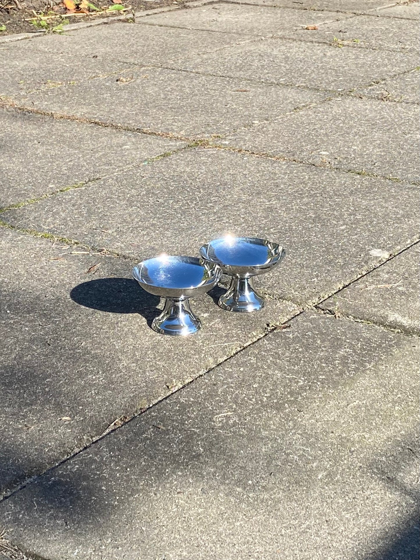 silver coupe on a pedestal