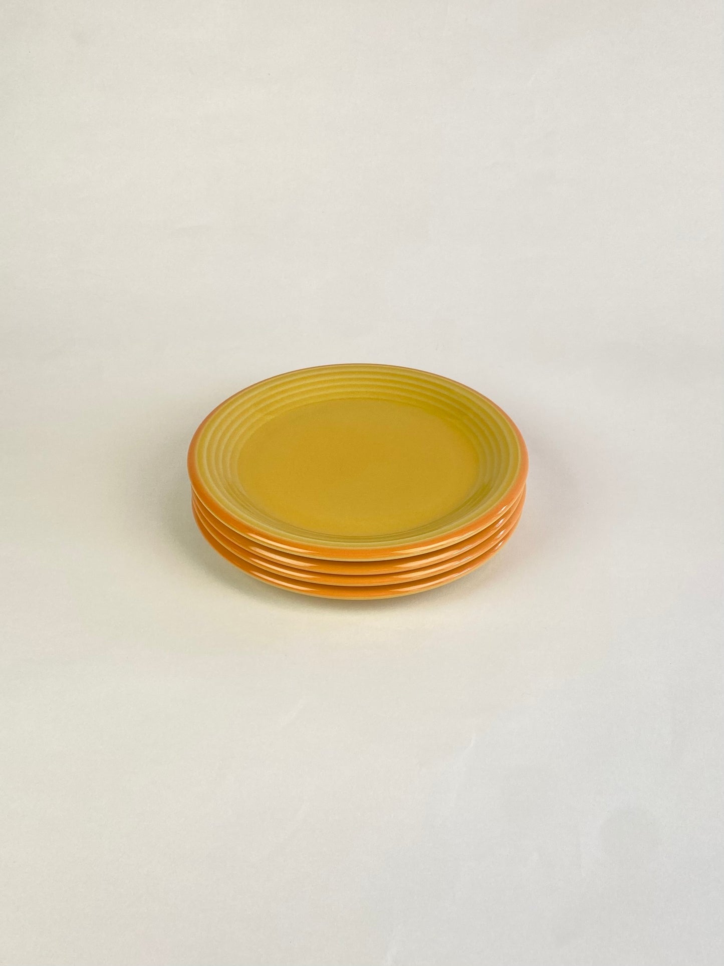 four sunny plates