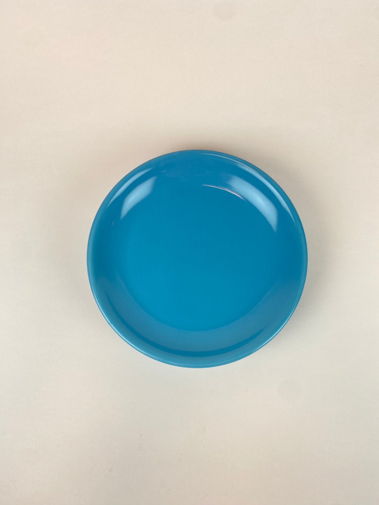 three blue plates