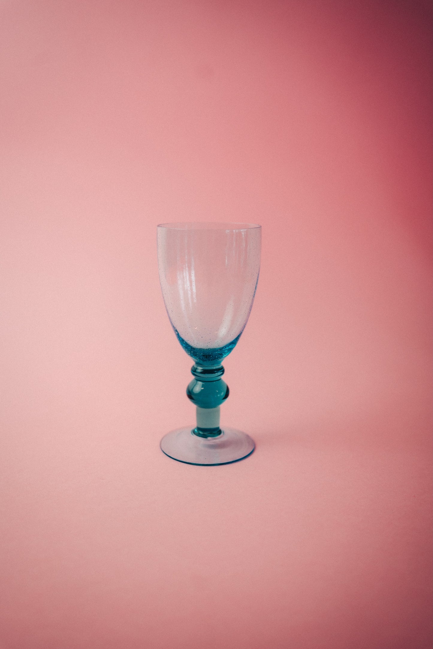three blue wineglasses