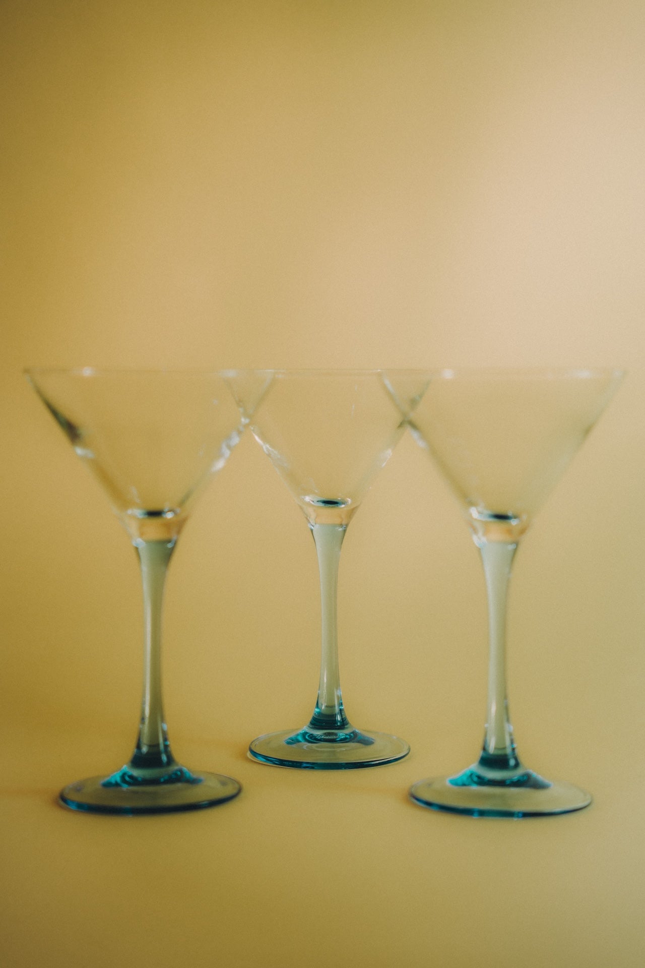 three blue cocktailglasses