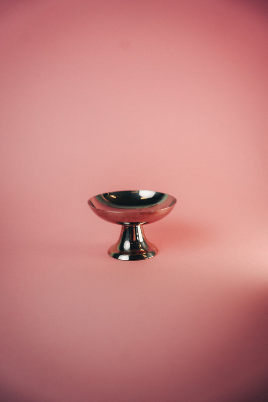 coupe on a pedestal