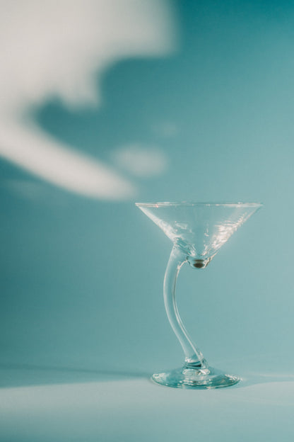 two curved cocktailglasses