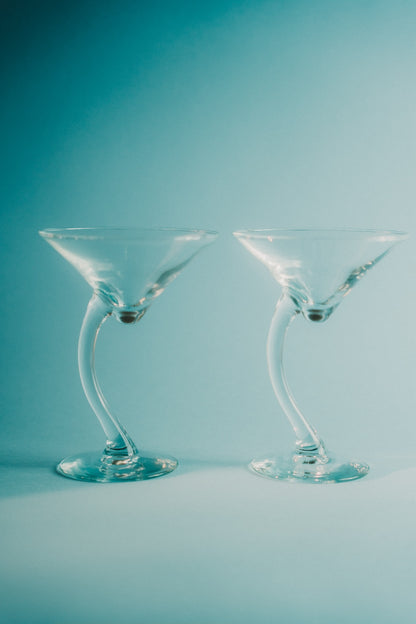 two curved cocktailglasses