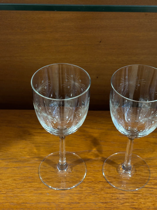 four detailed wineglasses