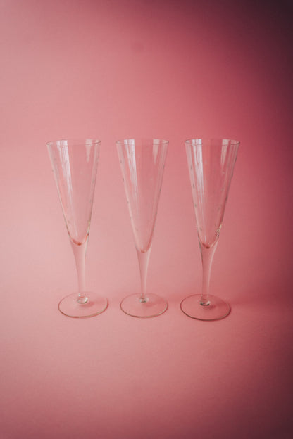 three engraved flutes