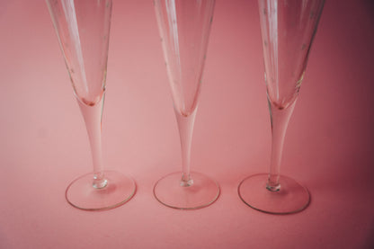 three engraved flutes