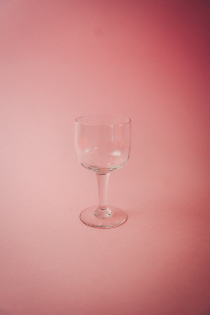 four faceted wineglasses