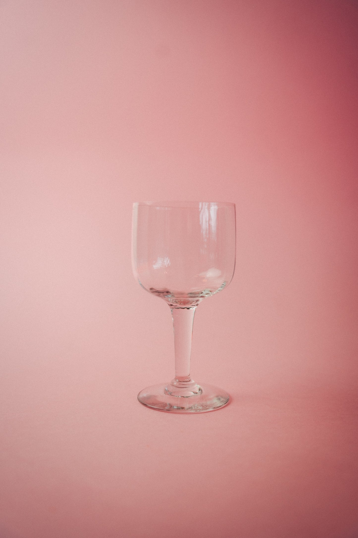 four faceted wineglasses