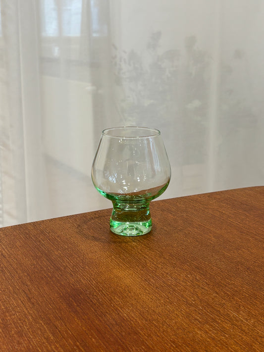 four green cocktailglasses