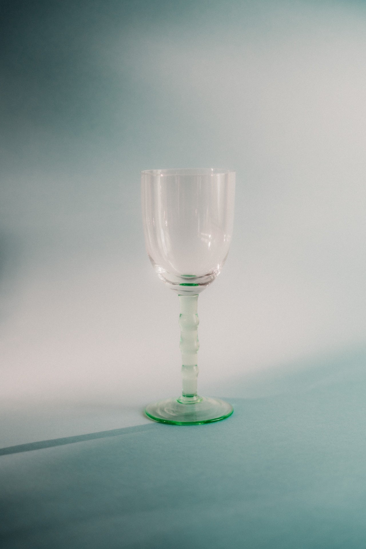 five green wineglasses