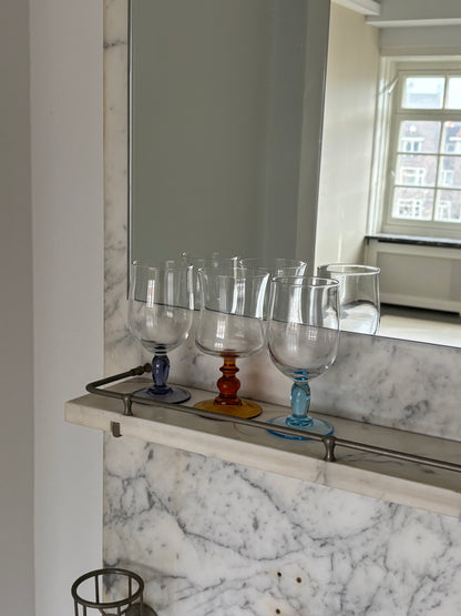 three mixed wineglasses