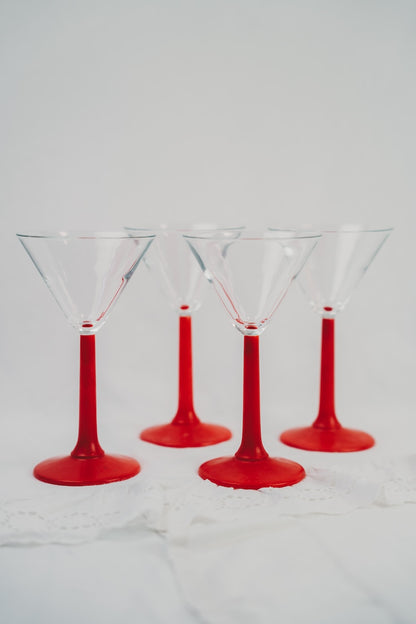 four martini glasses