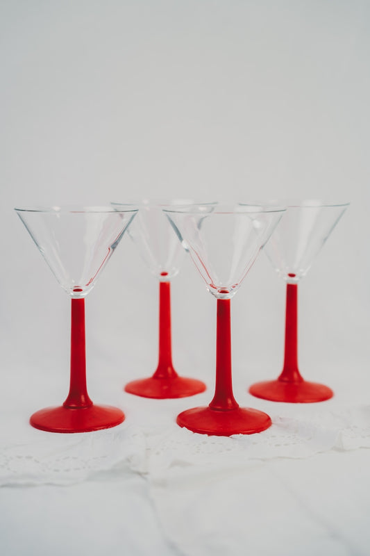 four martini glasses