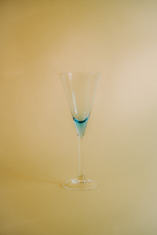 three blue wineglasses