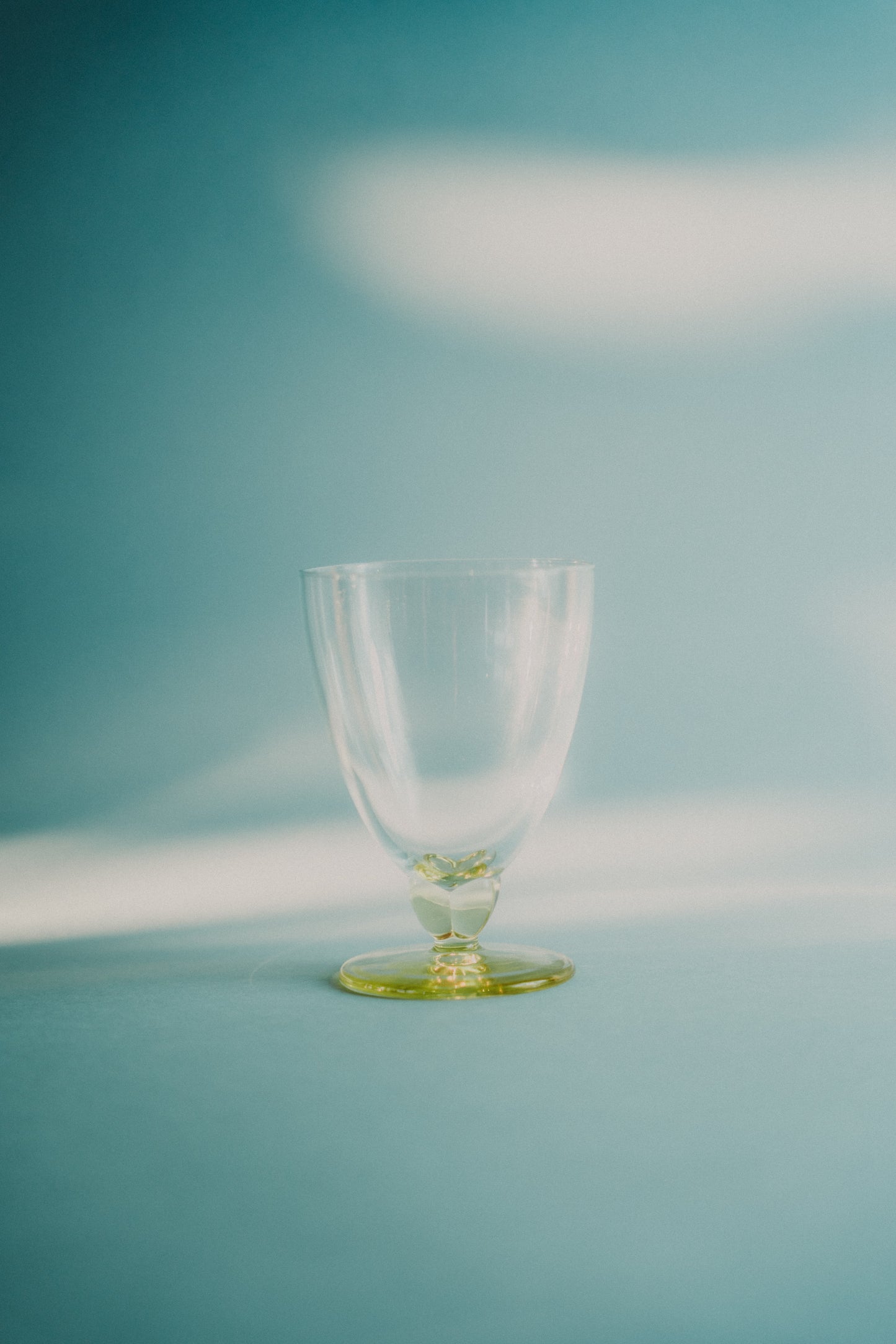 five yellow wine/waterglasses