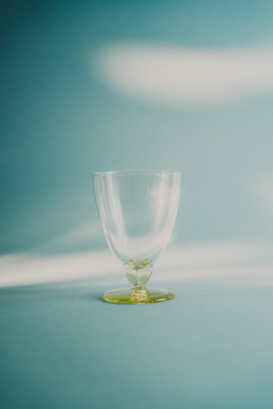 five yellow wine/waterglasses